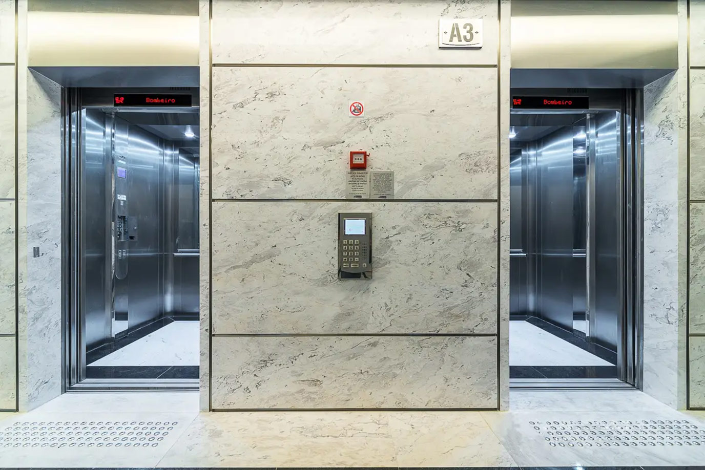 bueno-netto-bradesco-seguro-7-piso-elevado-granito-branco-polar-granito-preto-sao-gabriel-elevador-marmore-branco-pigues-di-marmore
